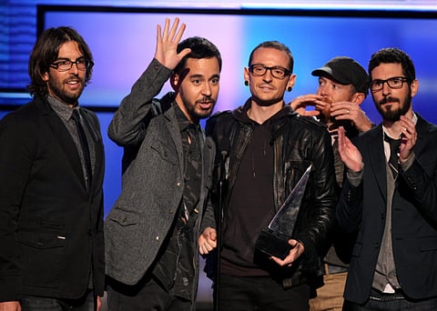 Members of Linkin Park, Rob Bourdon, Mike Shinoda, Chester Bennington, Dave Farrell, Brad Delson, accept the award for favorite artist - alternative rock at the 40th Annual American Music Awards on November 18, 2012, in Los Angeles.