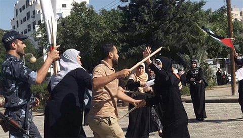 Hamas police attack women gathering with sticks