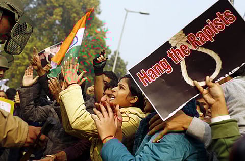 Women demanding action in New Delhi following the rape and murder of Nirbhaya in a moving bus