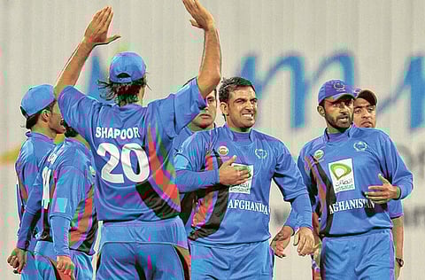 Afghanistan team rejoice at the fall of a wicket during a ODI against Pakistan in Sharjah a few years back.