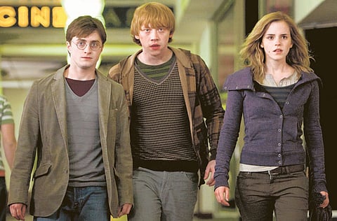 Danial Radcliffe, Rupert Grint and Emma Watson in 'Harry Potter and the Deathly Hallows - Part 1'.