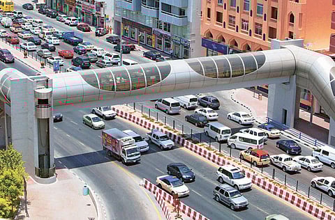 A pedestrian footbridge on Abu Bakr Seddiqi Road in Dubai.