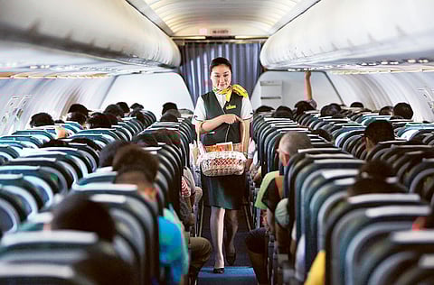 An airlines crew member sells food on board an Airbus A320 aircraft (File image)