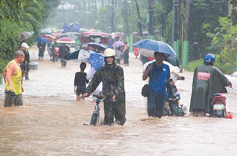 Floodwaters and landslides triggered by a tropical depression that battered many areas in the Philippines over the weekend have left at least eight people dead, two injured and one missing.