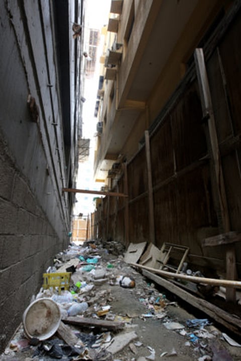 Unfinished parking lots turn into dumpsters