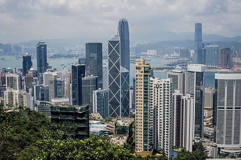 The Hong Kong skyline. Hong Kong Monetary Authority intervened for the sixth straight day to defend the city's currency peg to the greenback.