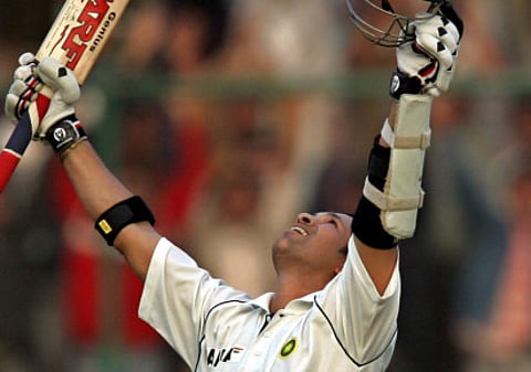 Sachin Tendulkar celebrates after completing one of his Test centuries, remains the highest rungetter in both Tests and One day Internationals nearly eight years after his retirement.