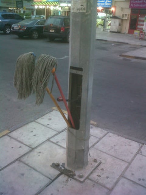 How irresponsible worker's wet mops put public in danger