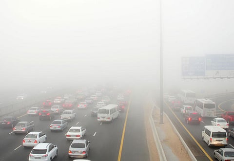 Motorists drive in foggy conditions. File picture.