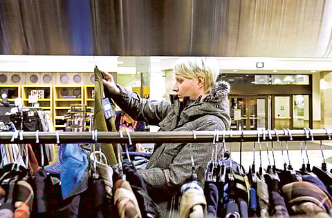 A flurry of data released Wednesday suggested that the spread of the virus is intensifying the threats to an economy still struggling to recover from the deep recession that struck in early spring.