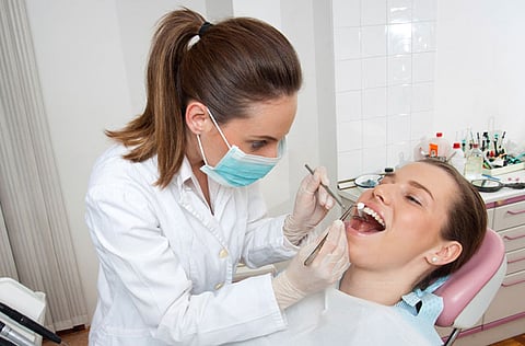 Dentist at work. Photo for illustrative purpose only
