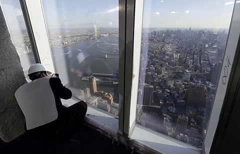File picture of the Manhattan skyline from the observation deck on the 100th floor of the One World Trade Center building.