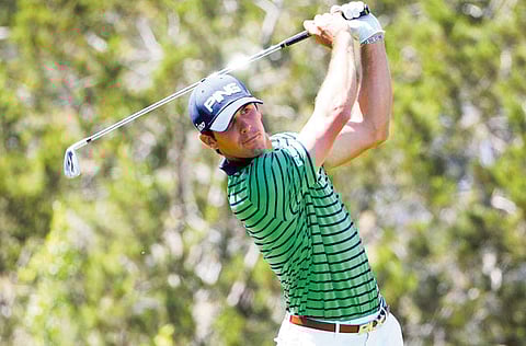 Billy Horschel hits his tee shot on the seventh hole during the second round of the
Valero Texas Open at the AT &T Oaks Course at TPC San Antonio on Friday.