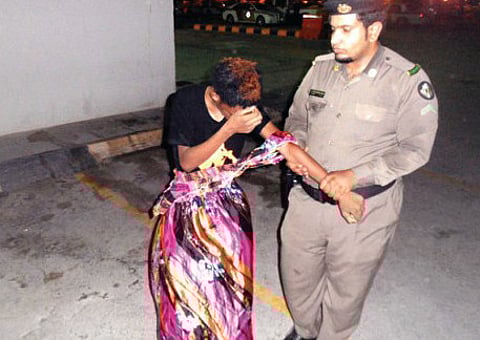 Cross-dressing beggar arrested in Saudi Arabia