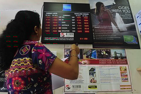 A currency exchange in Mumbai. Indian rupee strengthened 43 paise to end at 73.39 against the US dollar on Friday supported by persistent foreign fund inflows and weak American currency.