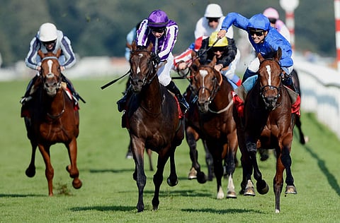 Flashback: Mickael Barzalona (right), riding Encke, wins the St Leger Stakes at St Leger Festival at Doncaster Racecourse in 2012.