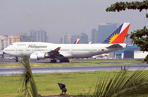 A Philippine Airlines (PAL) plane maneuvers on the runway of the Manila international airport, Philippines.