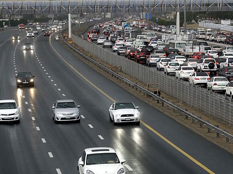 Traffic on Shaikh Mohammed Bin Zayed Road during heavy rain in Dubai.