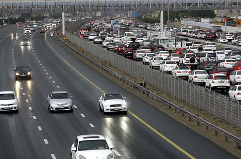 Traffic on Shaikh Mohammed Bin Zayed Road during heavy rain in Dubai.