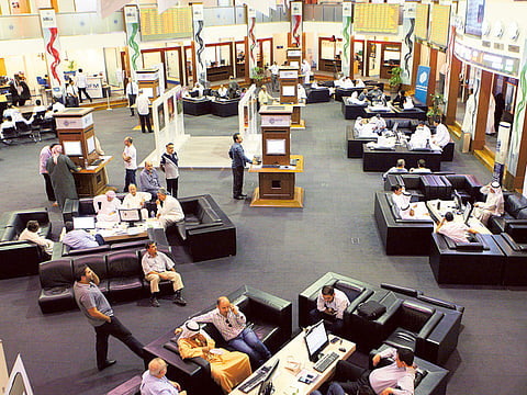 Investors at the Dubai Financial Market in World Trade Centre. Tangible progress is being made across the globe to support Islamic finance and further Sukuk issuance.
