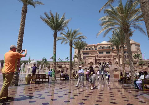 Tourists at Emirates Palace Hotel in Abu Dhabi.