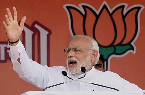 Prime Minister Narendra Modi addresses an election campaign rally for BJP candidates in Baramati, Maharashtra on Thursday.