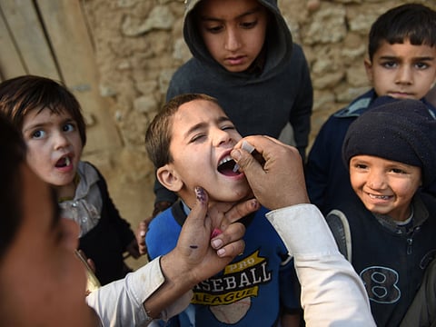 Polio vaccination being administered to a child in a neighbourhood hosting Afghan refugees and internally displaced tribal people in Pakistan. Picture for illustrative purposes only.