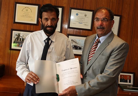 Taxi driver honoured for returning Dh100,000