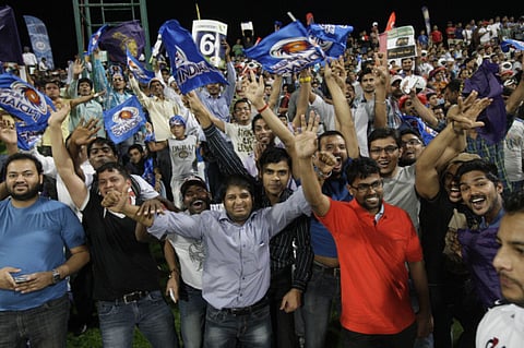 A choc-a-block stand at Zayed Stadium in Abu Dhabi enjoy a match between Kolkata Knight Riders and Mumbai Indians during the 2014 IPL.