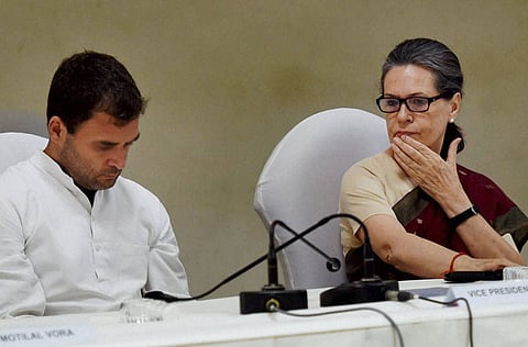 Congress President Sonia Gandhi with party Vice President Rahul Gandhi at the CWC meeting at party headquarters in New Delhi on Monday.