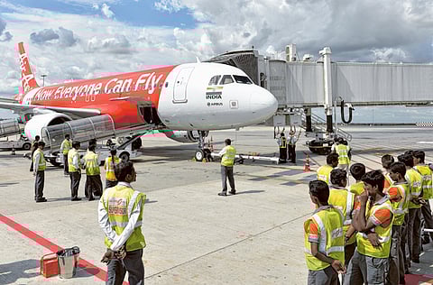 An AirAsia India Airbus A320 at Bengaluru. AirAsia Group Bhd.is is selling its 32.7 per cent stake in AirAsia India Ltd. to its partner Tata Sons Ltd.
