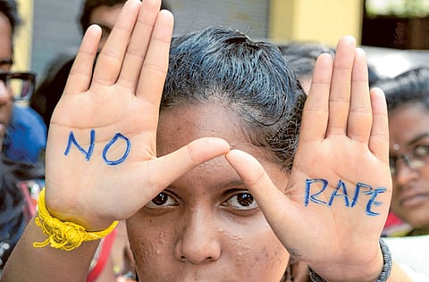 Indian students participate in an anti-rape protest in Hyderabad in a file photo.