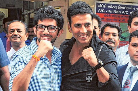 Indian Bollywood actor Akshay Kumar (R) and chief of the Yuva Sena political party Aaditya Thackeray
