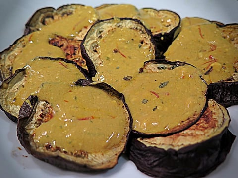 Roasted aubergine, saffron yogurt and pomegranate molasses