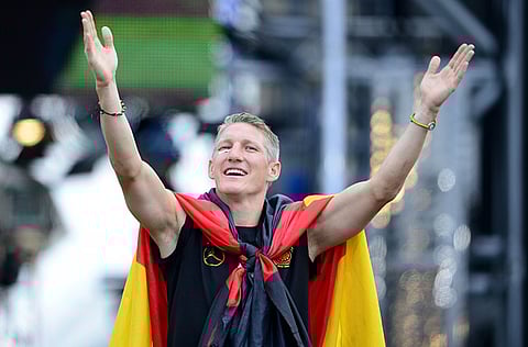 Germany's midfielder Bastian Schweinsteiger celebrates.