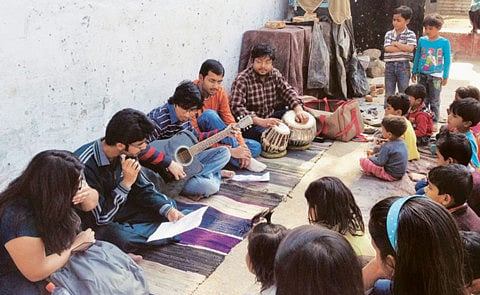 Musical mentors of slum children in India