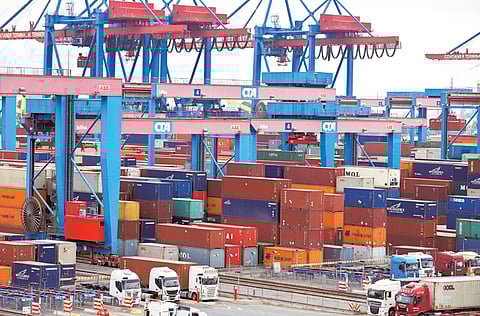 FILE - The June 16, 2014 file photo shows containers in the Hamburg, northern Germany, harbour. The