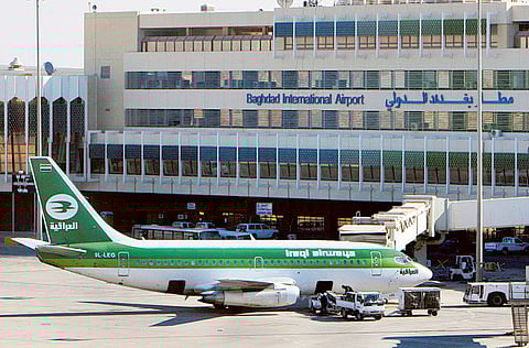 An Iraqi Airways plane sits on the tarmac at Baghdad International Airport.
