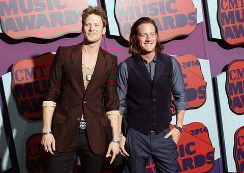 Wade Payne/Invision/AP