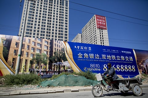 A property development in Beijing. China’s property developers have mounting bills to pay in January and shrinking options to raise necessary funds.