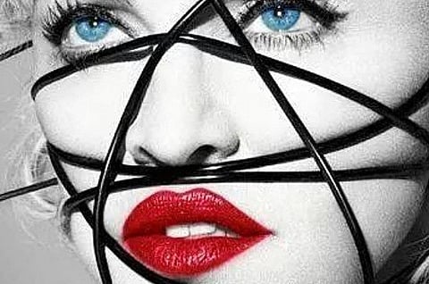 Madonna defends altered Mandela photos