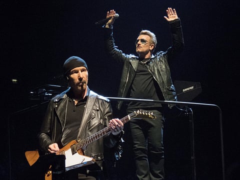 Paris attacks: U2 cancel concert, pray for fans