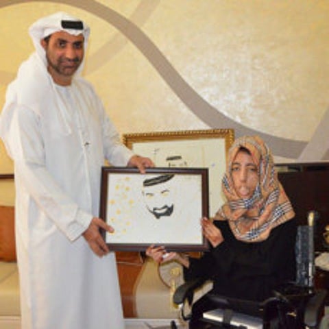 Emirati artist volunteers work for her country
