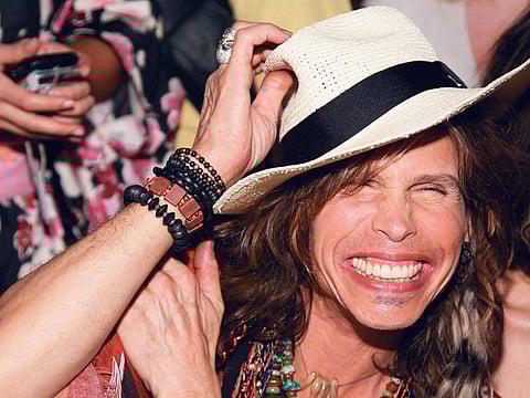 Steven Tyler sings at Rolling Stone party