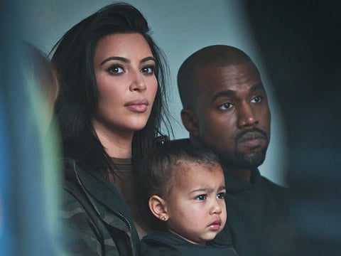 Kanye West with wife Kim Kardashian and daughter North