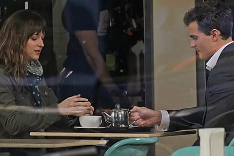 ‘Fifty Shades’ goes global, but too hot for some