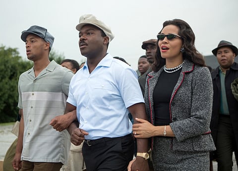 David Oyelowo, center, and Carmen Ejogo, right, in “Selma.”
