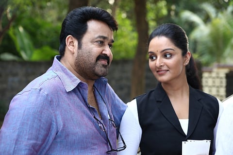 Manju Warrier and Mohan Lal in ‘Ennum Eppozhum’