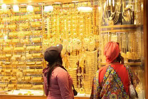 A scene at the Dubai gold market: Spot gold was up 1.5 per cent at $1,496.05 per ounce at 1205 GMT, having touched $1,498.57, its highest since April 2013.