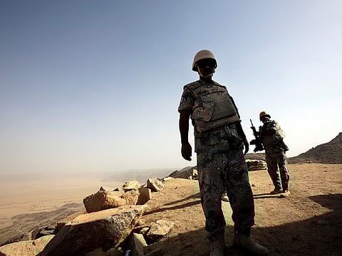 Saudi soldiers stand alert at the border with Yemen in Najran, Saudi Arabia on April 21, 2015.